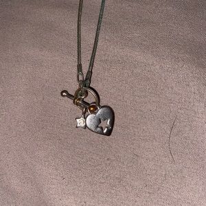 Silver necklace with heart/star decal